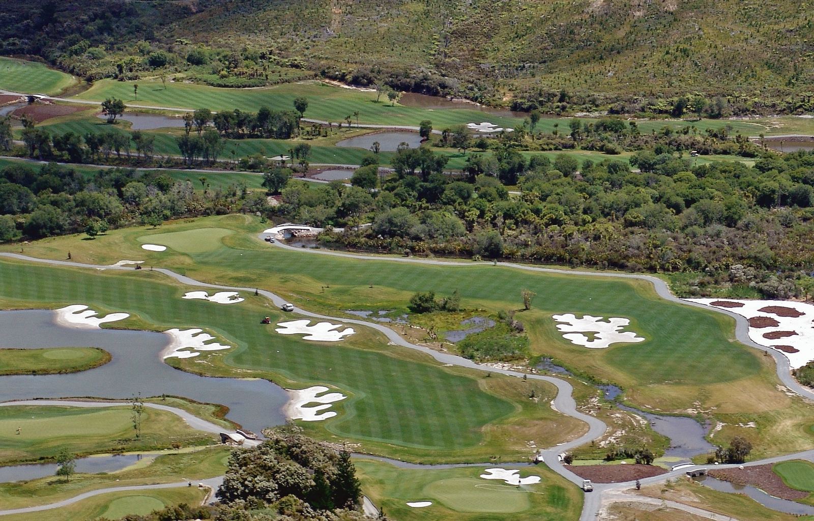 Aerial of fairways, bunkers and water hazards